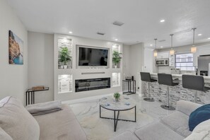 Living area - Spacious Pool Home + Private Suite Near Airport! Sleeps 12! (Tampa)