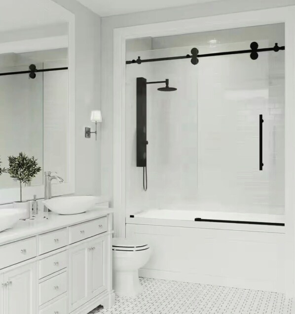 Shower, towels, soap, toilet paper