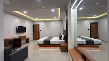 Deluxe Room, City View | Desk, laptop workspace, free WiFi