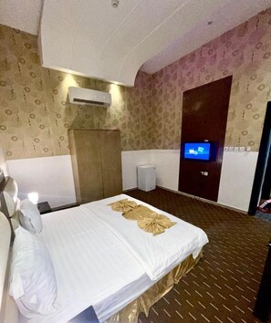 Deluxe Room, City View | Iron/ironing board, free WiFi - Quiet Rooms 5   (Riyadh)