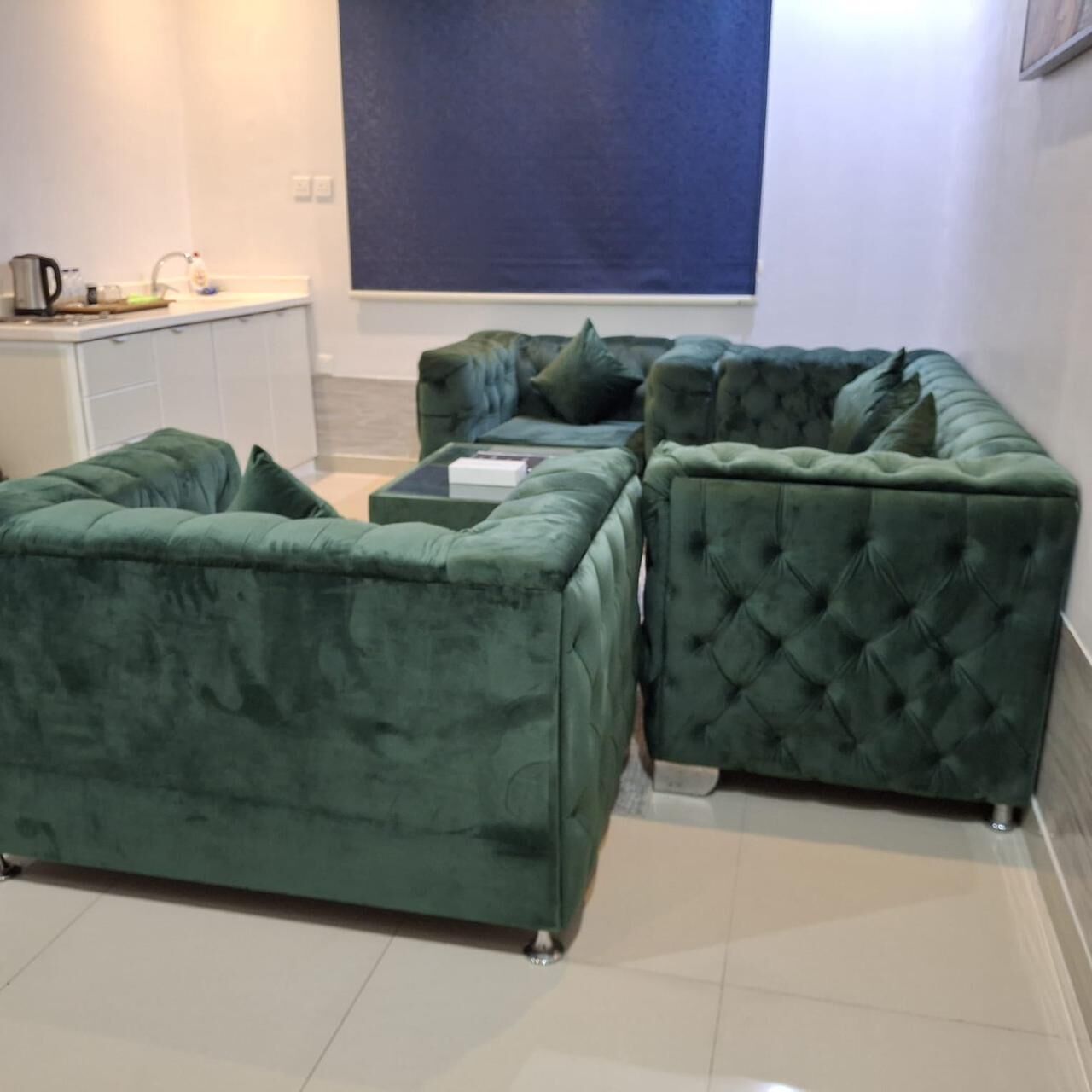 Suite Deluxe, vista a la ciudad | Área de sala de estar