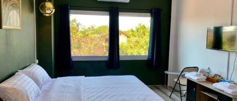 Cortinas blackout, quartos à prova de som, Wi-Fi de cortesia