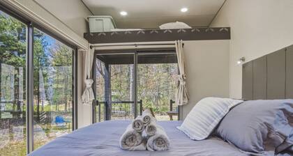 Round Lake Getaway Camper: Full Kitchen, 2 BR's, Dock, Pedal Boat Near Ludington
