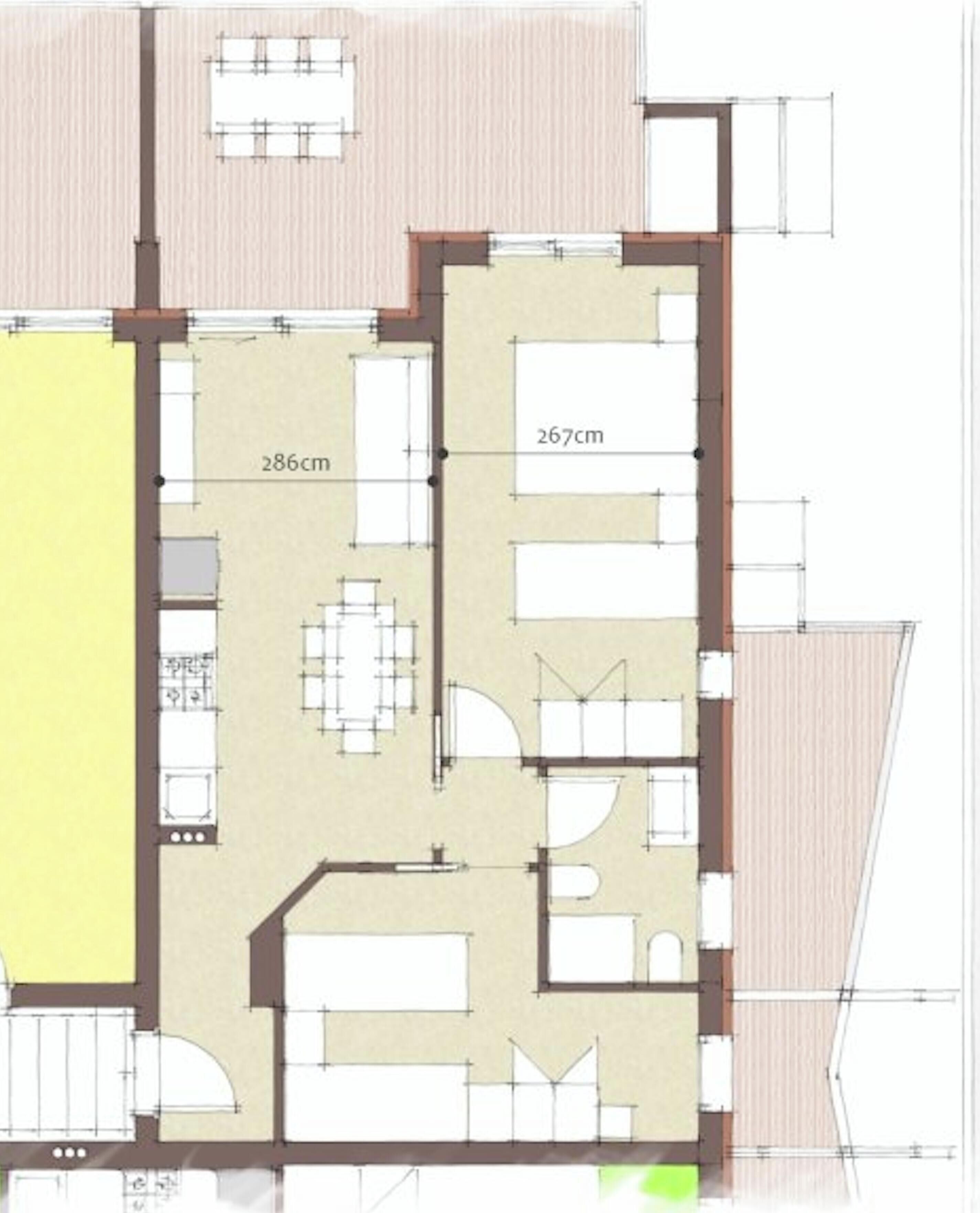 Un plan d’étage comprenant un espace repas, une cuisine et plusieurs chambres.