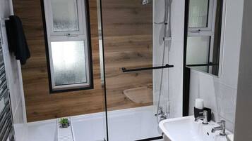 Hair dryer, towels, soap, shampoo