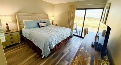 Steps from the Beach with Gulf View Ground Floor
