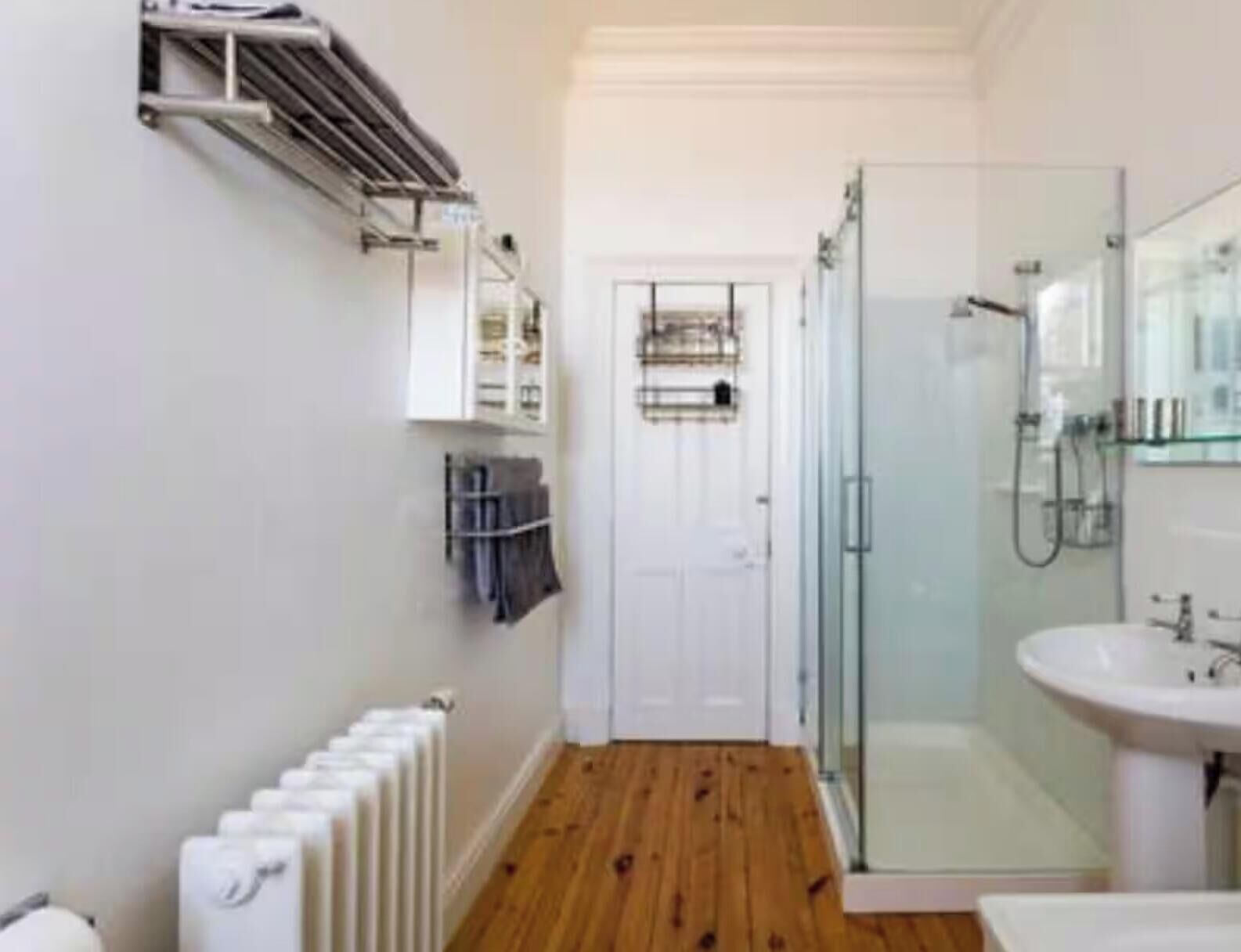 Separate bathtub and shower, deep-soaking bathtub, hair dryer, towels