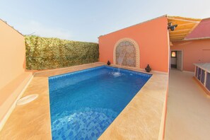 Outdoor pool, pool umbrellas, pool loungers