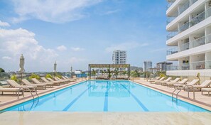 2 outdoor pools, pool umbrellas, pool loungers - Cartagena Beach Resort By HostPro (Cartagena de Indias)