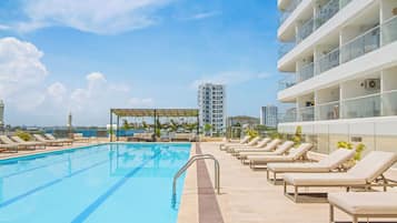 2 outdoor pools, pool umbrellas, pool loungers
