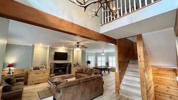 Smart TV, fireplace, DVD player, books