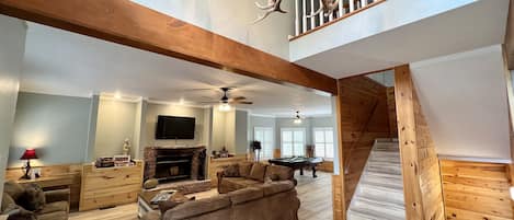 Smart TV, fireplace, DVD player, books