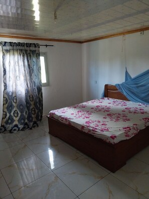 Iron/ironing board, bed sheets - Lovely kribian house in earthen brick  (Kribi)