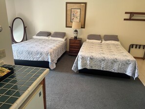 Room - Hotel Room with 2 queen beds, sitting area, deck and large 2 person Jacuzzi tub (The Forks)
