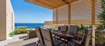Sea View Panorama | Green Coast 2BR Patio Retreat by PikHost