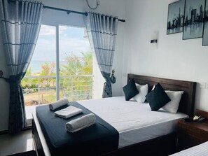 Deluxe Double Room, Balcony, Ocean View | Laptop workspace, free WiFi