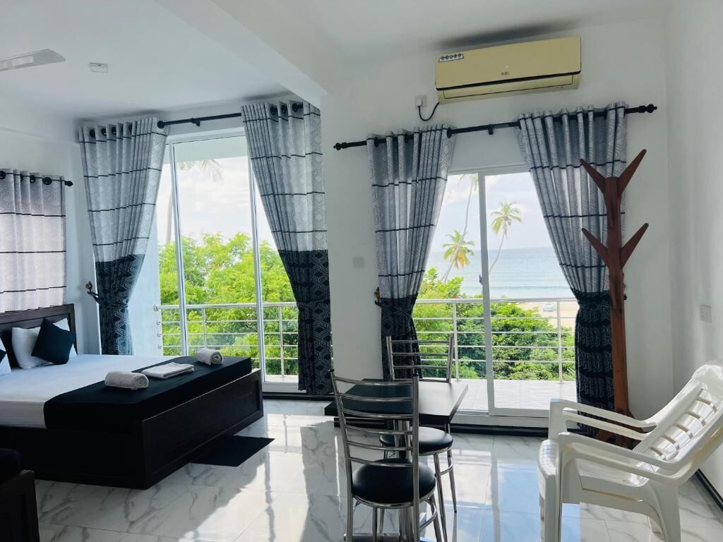 Deluxe Double Room, Balcony, Ocean View | Laptop workspace, free WiFi