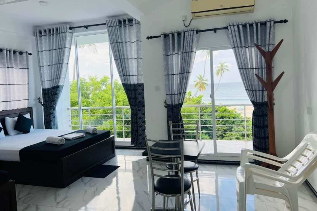 Deluxe Double Room, Balcony, Ocean View | Laptop workspace, free WiFi