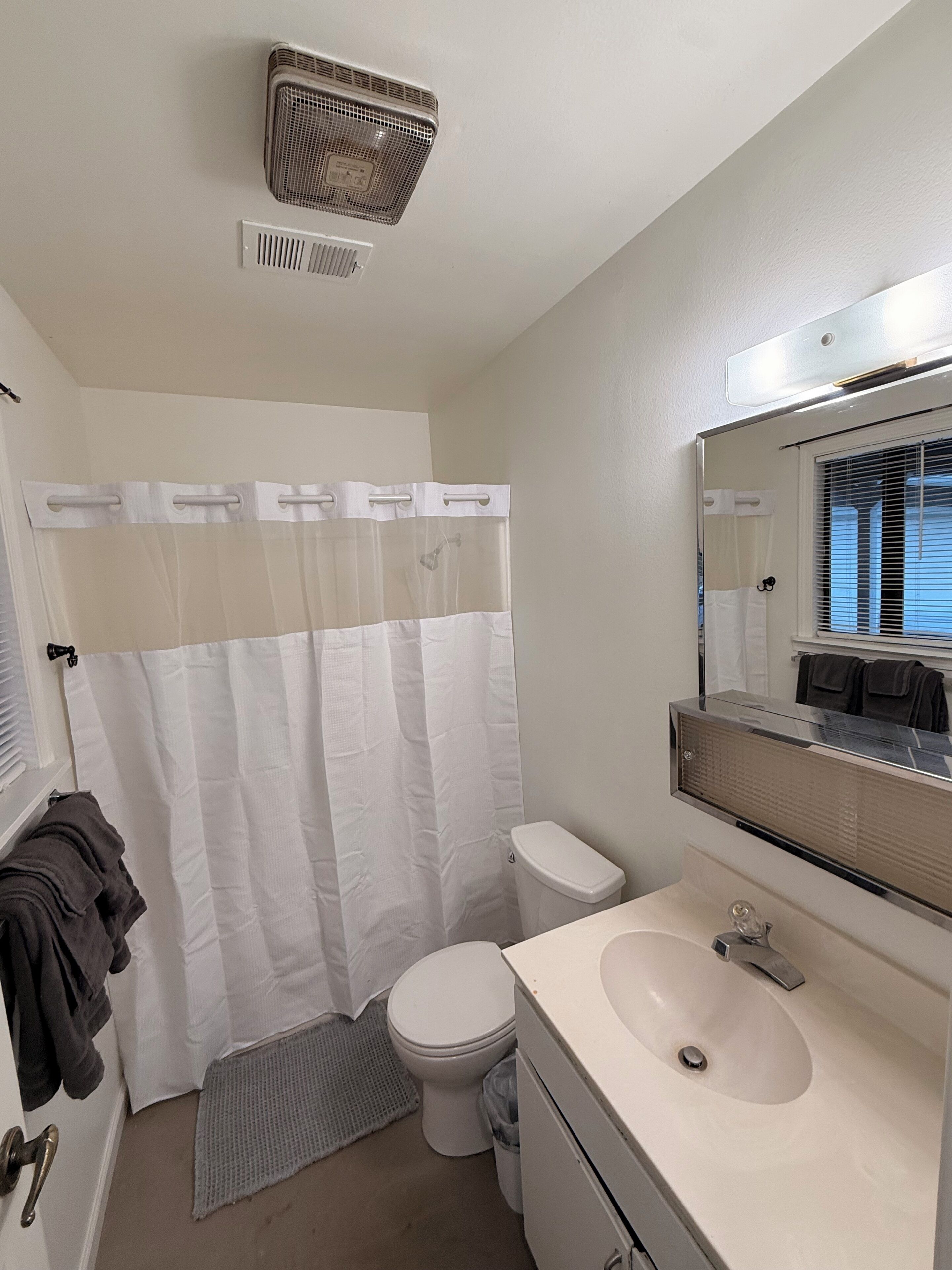 Hair dryer, towels, soap, toilet paper