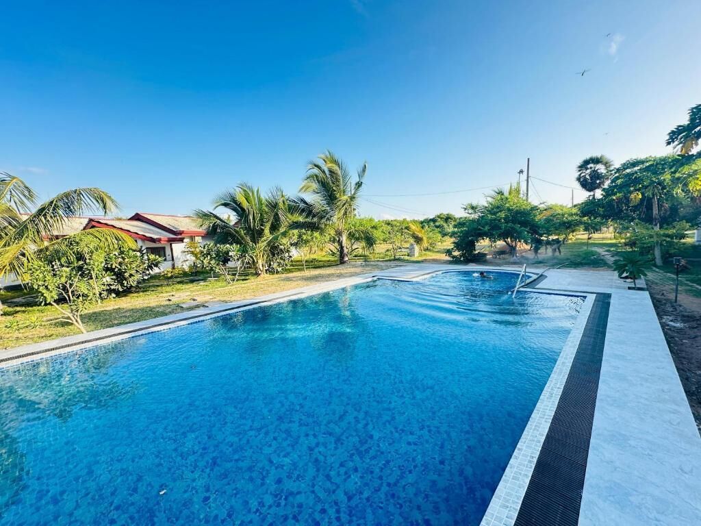 Chambre Deluxe double, vue sur le jardin | Piscine | Piscine extérieure