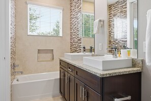 Villa (4 Bedrooms) | Bathroom | Bathtub, towels, soap, shampoo - Family Retreat With 4bed Suites & Private Jacuzzi (Kissimmee)