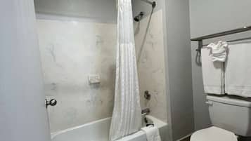 Combined shower/tub, towels, soap, shampoo