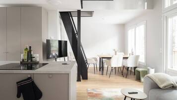 Chalet, 3 chambres, patio | Coin séjour | Livres