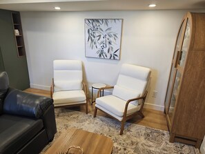 Living area - 5th Avenue All New Basement Suite (Lethbridge)