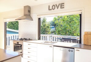 Fridge, oven, stovetop, dishwasher - Skomer House - Sea Views & Central Waiheke Living (Waiheke Island)