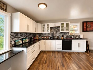 Coffee/tea maker, fridge, microwave, oven