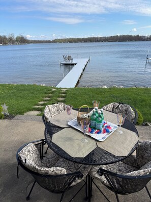 Outdoor dining - Charming updated 3-bedroom waterfront home on Lake George in Fremont IN with AC (Fremont)