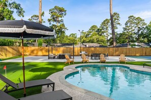 Outdoor pool, a heated pool - 5BR /3BR Luxury Oasis- Pool, Spa, Mini Golf, Pickleball, Basketball (Spring)