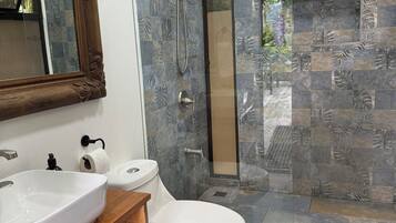 Shower, hair dryer, towels, soap