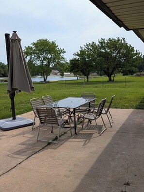 Outdoor dining - Delightful 2-bedroom home on acreage in charming Foristell, Lake, walk to winery (Foristell)