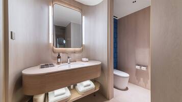 Bathroom | Shower, hair dryer, slippers, towels