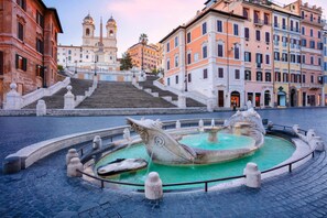 A historic square with a central fountain, a grand staircase, and classical architecture. - Ottavia Residence Apartment Gold 2 Pax (Rome)