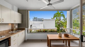 Fridge, microwave, stovetop, coffee/tea maker - Resort-Style Apartment Steps from Dining, Beach & Marina in Port Douglas (Port Douglas)