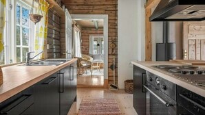 Private kitchen - Exclusive wilderness stay with private shoreline (Hedalen)