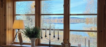 Log cabin with lake view by lake Björken