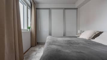 Desk, laptop workspace, blackout curtains, iron/ironing board