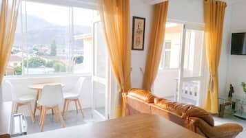 Apartamento, 1 quarto | Área de estar