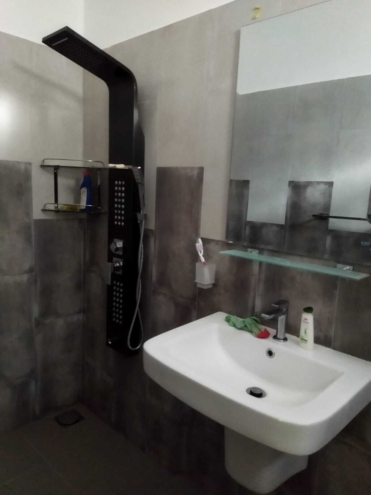 Shower, towels, soap, shampoo
