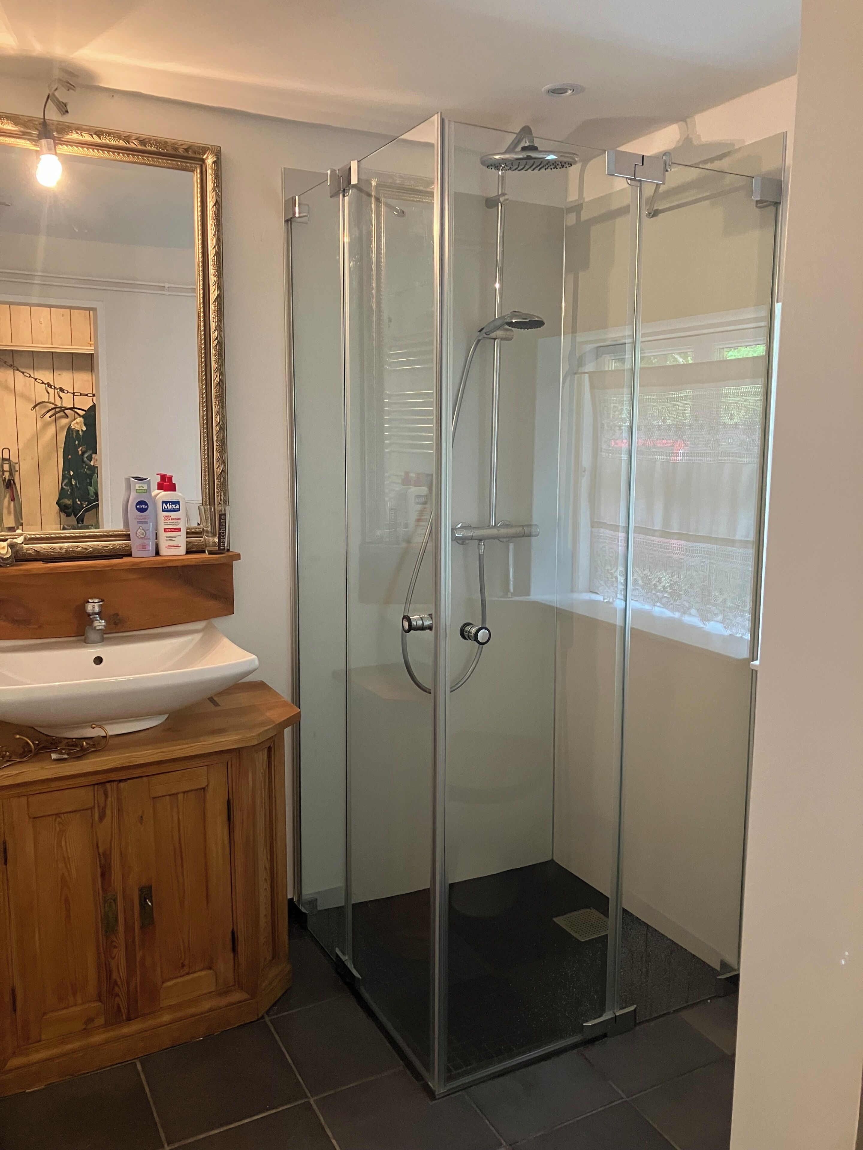 Shower, hair dryer, towels, soap
