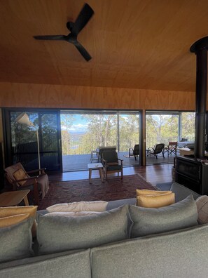 Living area - Tathra, bush retreat,  2 km from stunning  Sapphire coast beaches. Pet Friendly! (Chinnock)
