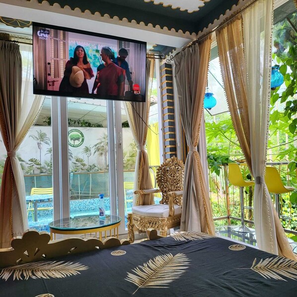 Luxury Double Room, Garden View | Desk, laptop workspace, blackout drapes, iron/ironing board