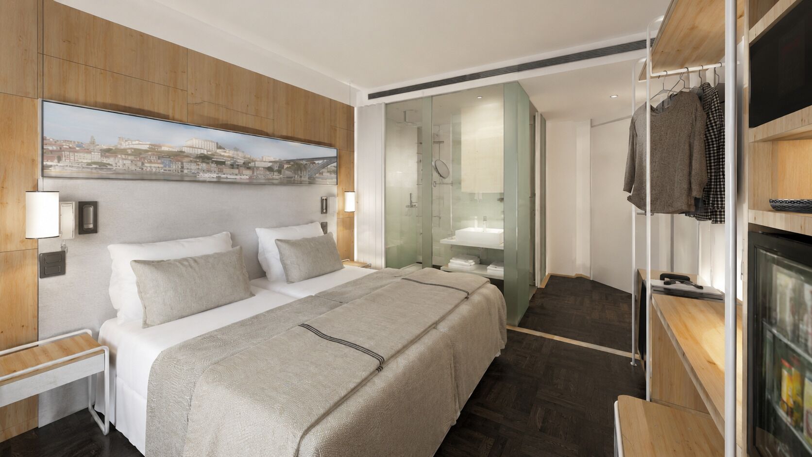Quarto de hotel moderno com uma cama grande, chuveiro em cabine de vidro, guarda-roupa de madeira e um quadro com vista para a cidade.