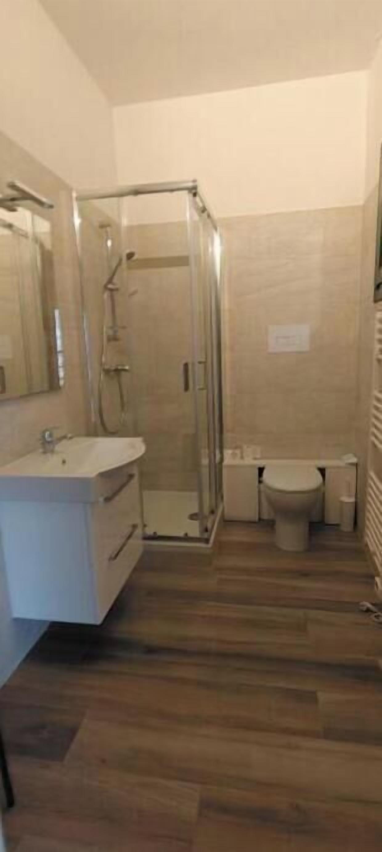 Shower, free toiletries, towels, toilet paper