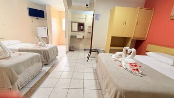 Standard Quadruple Room | In-room safe, iron/ironing board, free WiFi