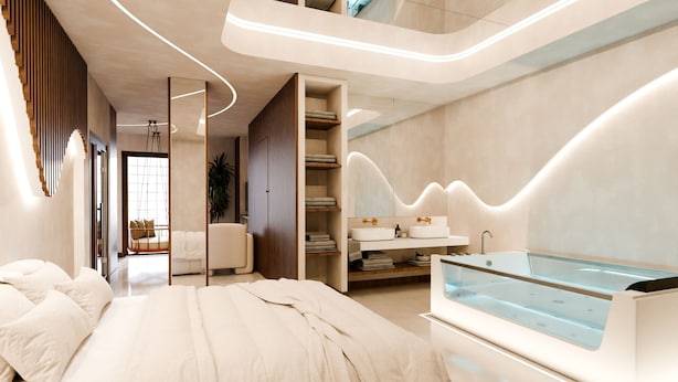 A modern bedroom with a large bed, a glass-enclosed bathtub, and a built-in wardrobe.