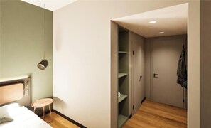 Caja fuerte, sistema de insonorización, wifi gratis y ropa de cama